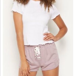 White scalloped edge solid tee